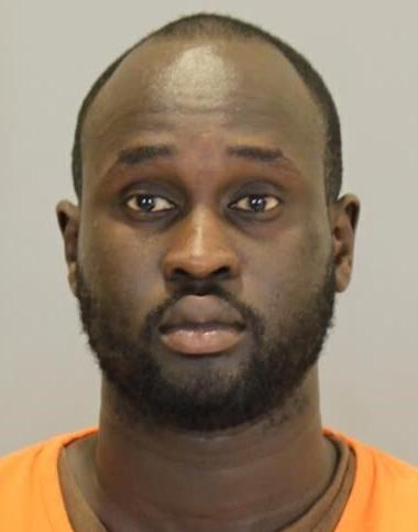Omahan charged in fatal shooting of two men